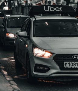 Up close picture of an Uber taxi